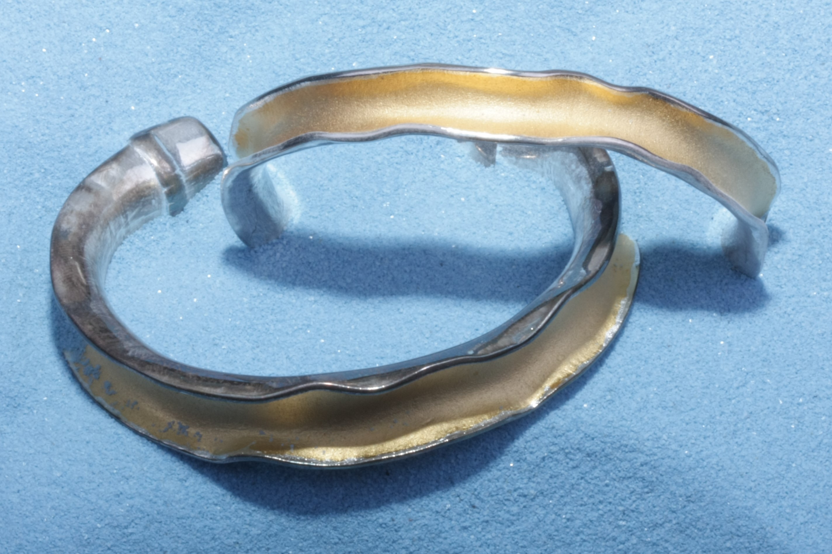 two wavey bracelets blue