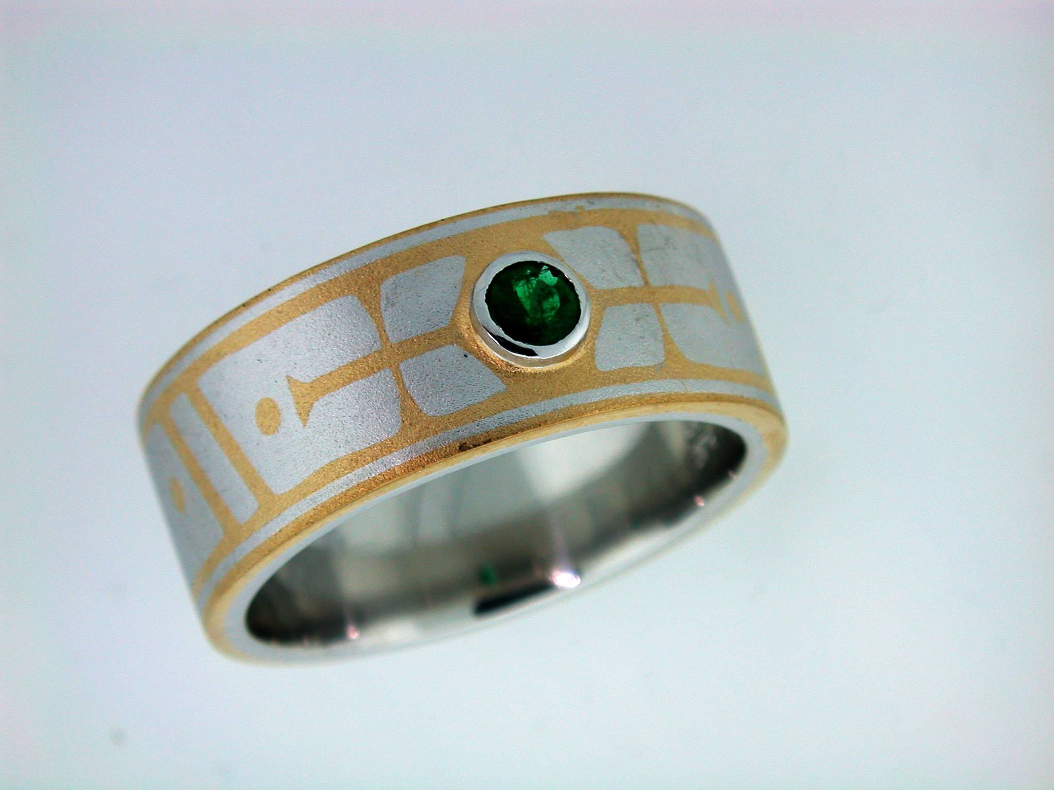 silver ring copperish design green stone