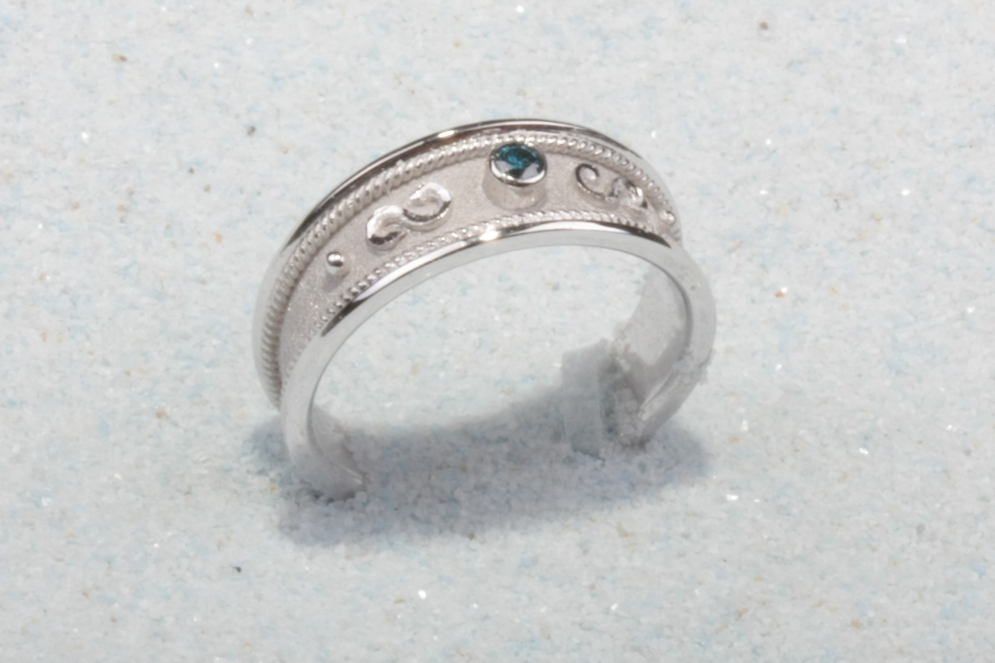 18k while gold ring light blue stone