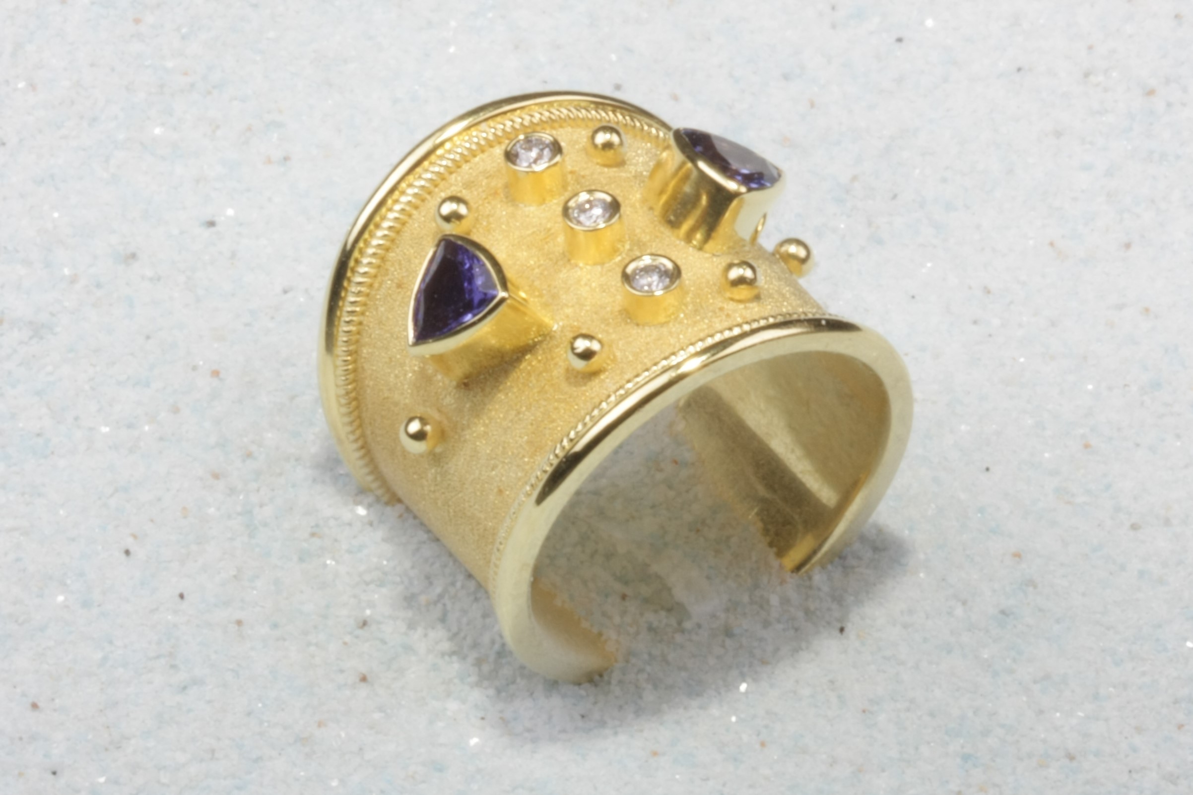 gold tone silver ring purple two stone