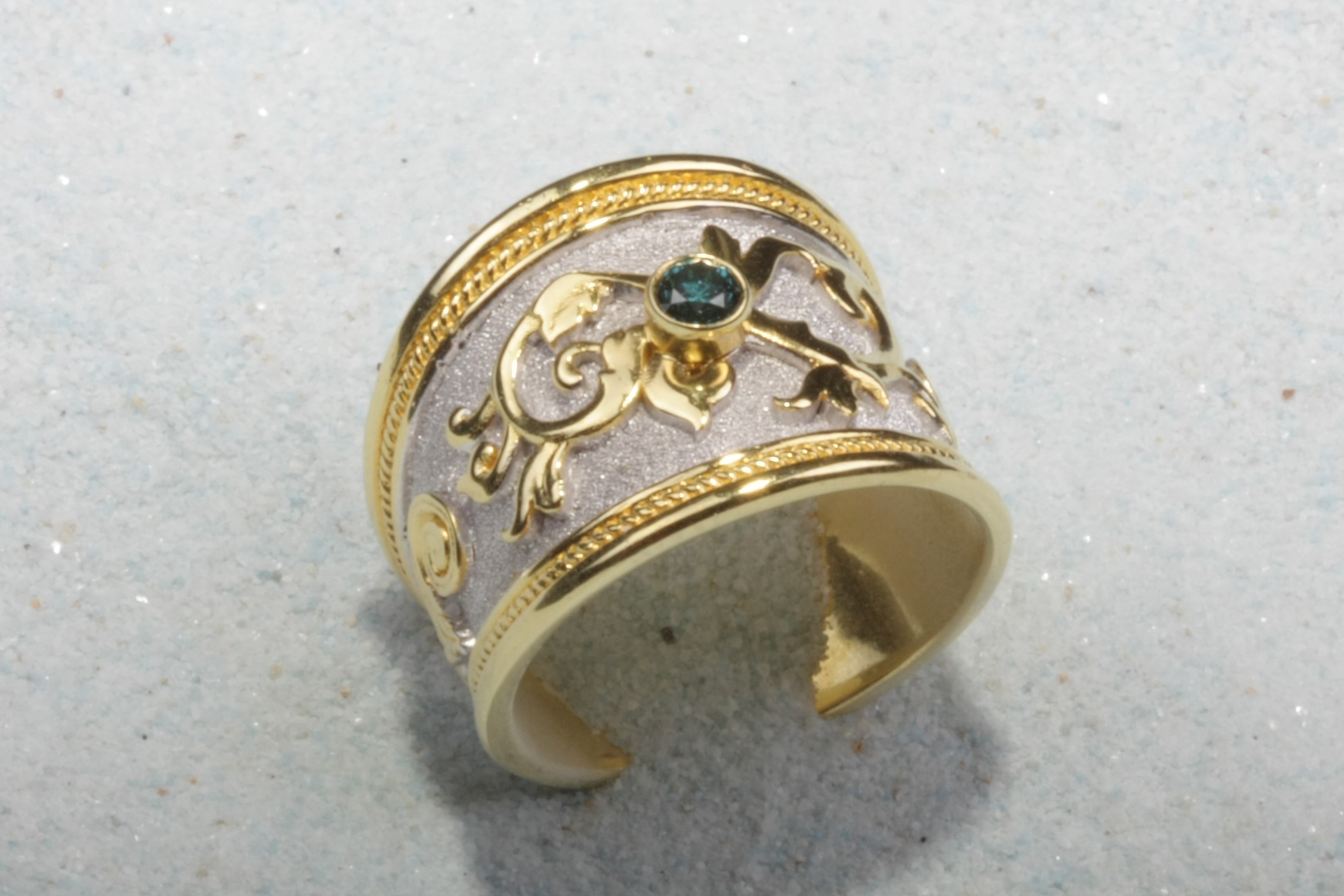 light gold tone silver ring green stone