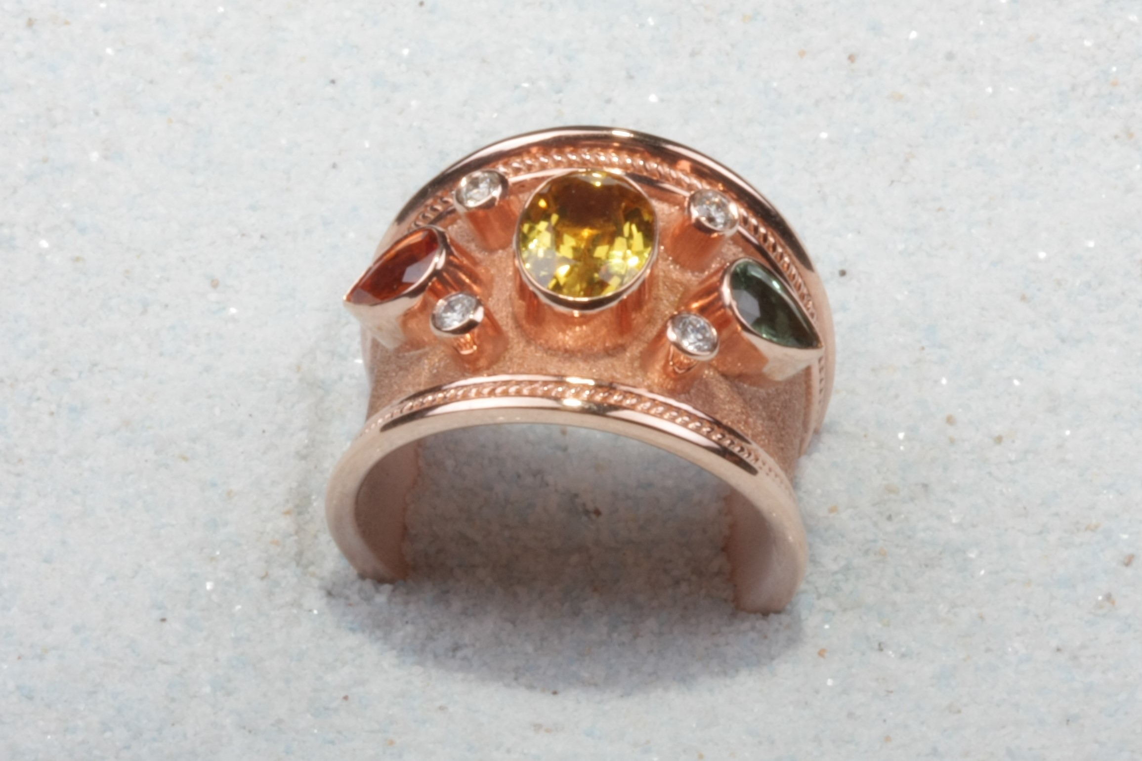 rose tone silver ring three stones