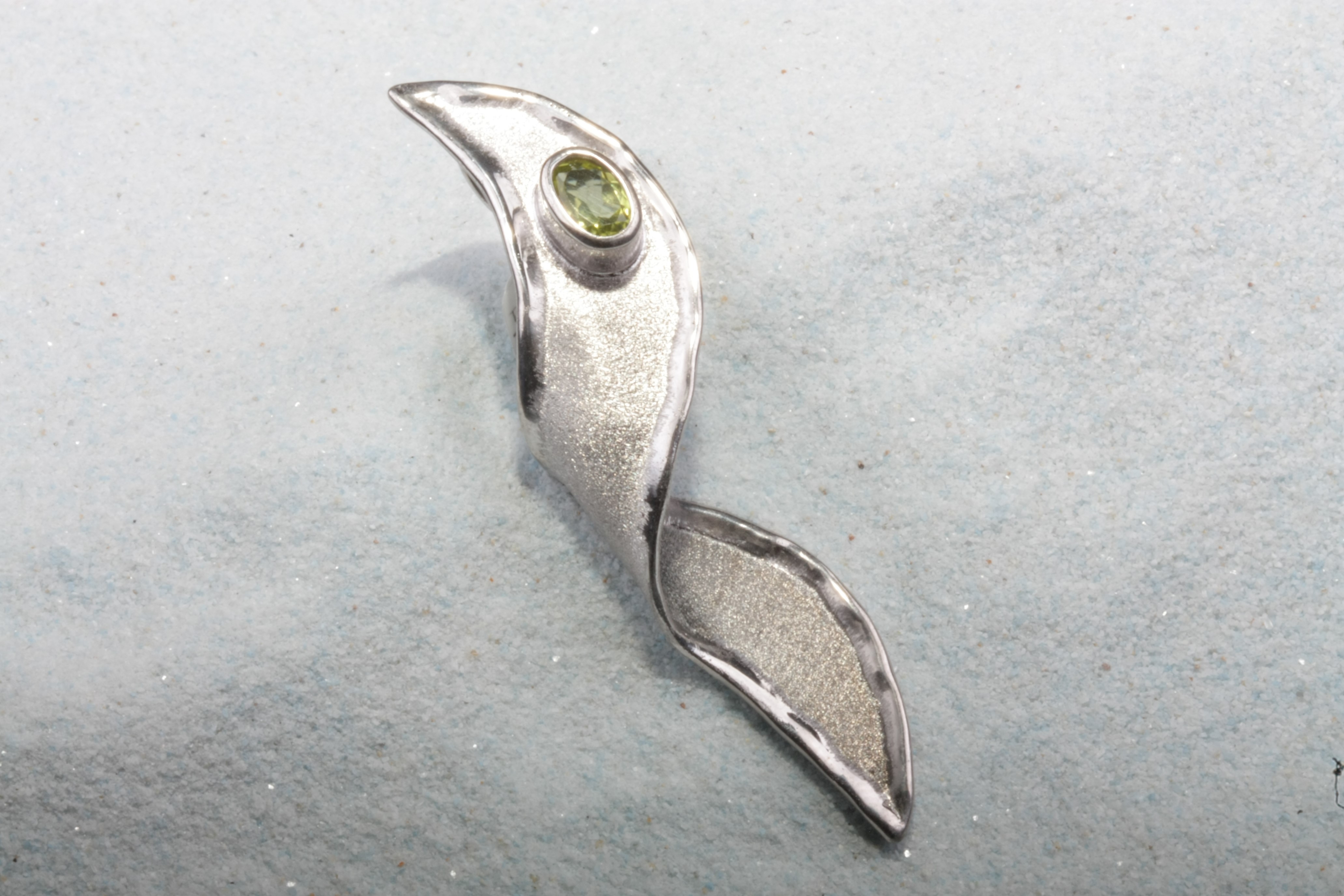 silver pendant peridot twist